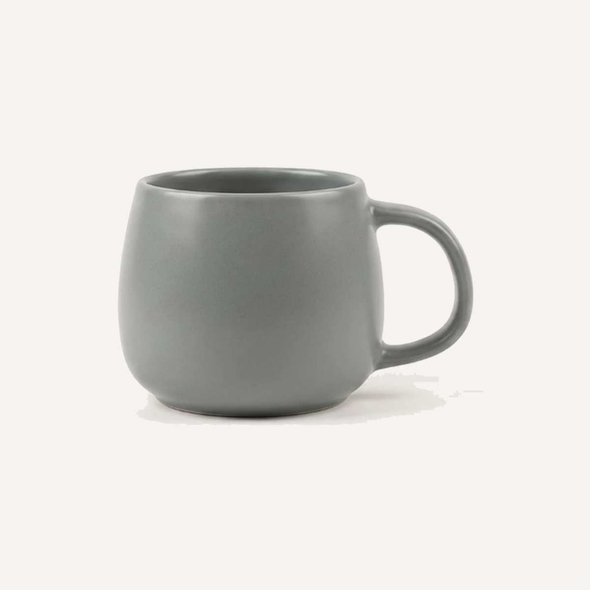 Mug in a single even matt grey glaze, the colour uniform from rim to base with no variation or flecking