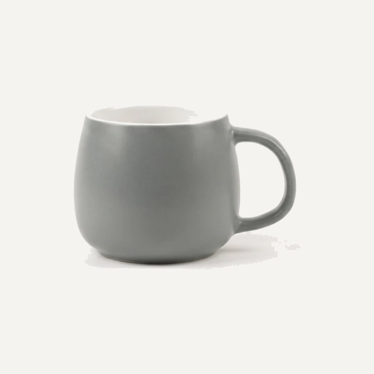 Mug glazed grey on the outside with a clean white interior, the two colours meeting in a crisp line at the rim