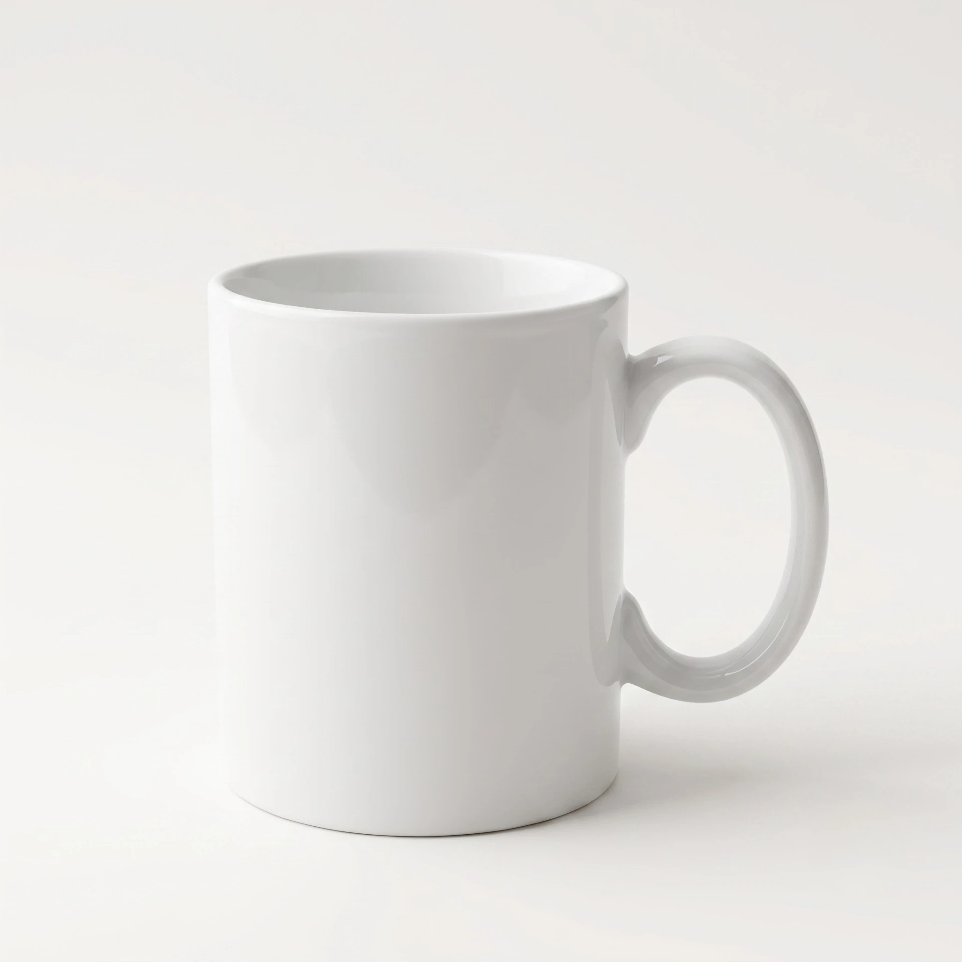 White ceramic mug with a wider round handle and taller body